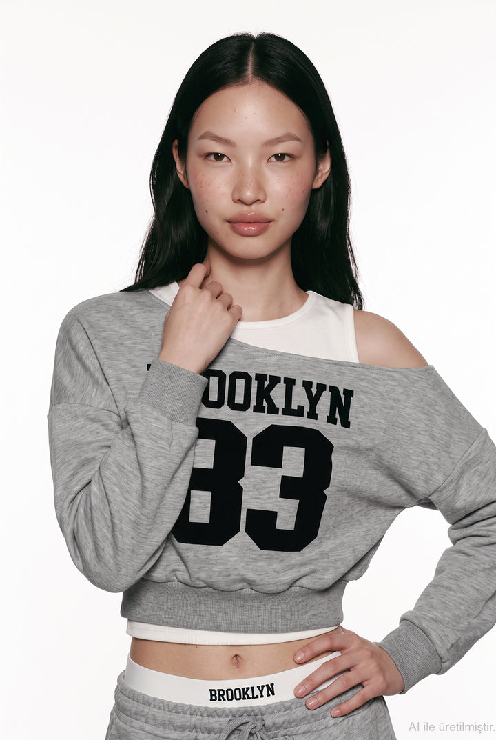 Atlet Detaylı Asimetrik Sweatshirt Grimelanj