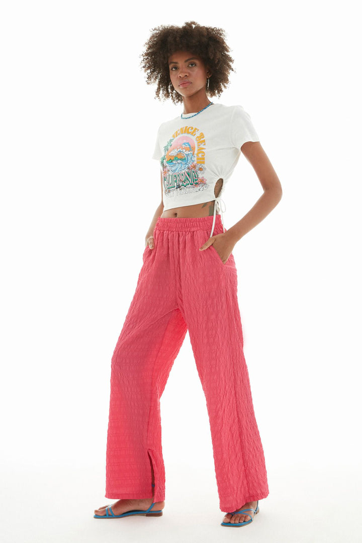 Paçası Yırtmaçlı Dokulu Pantolon Pembe