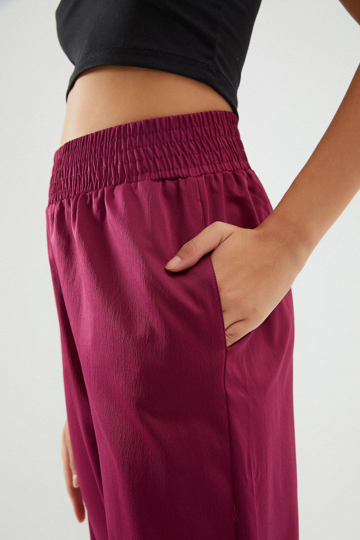 Beli Lastikli Saten Pantolon Fuşya