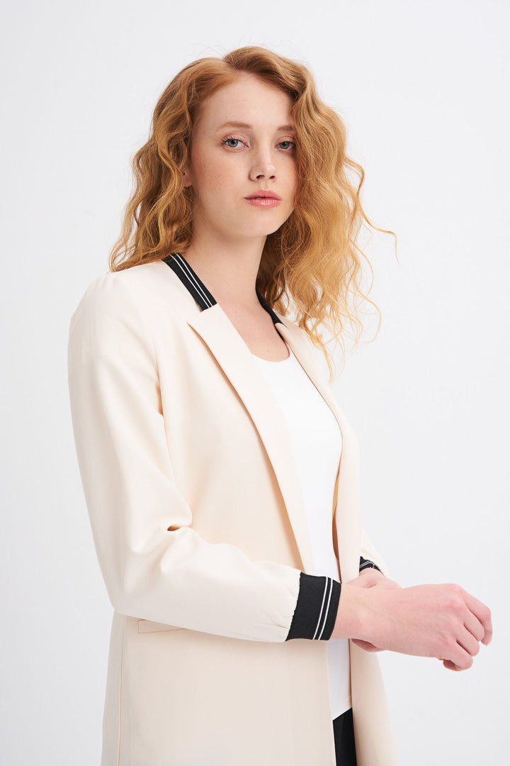 Ribanalı Fleto Cepli Uzun Ceket Kemik